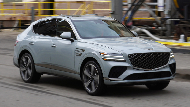 2025 Genesis GV80 Coupe front three quarters rolling shot