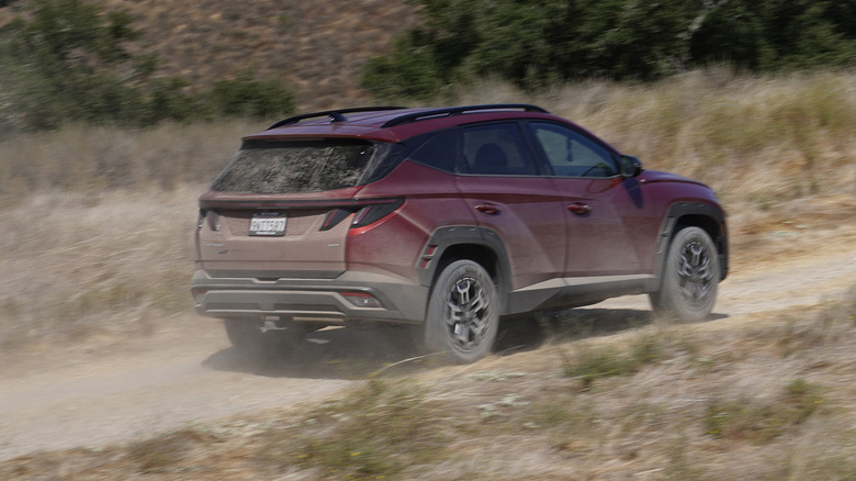 2025 Hyundai Tucson XRT blasting down a dirt road