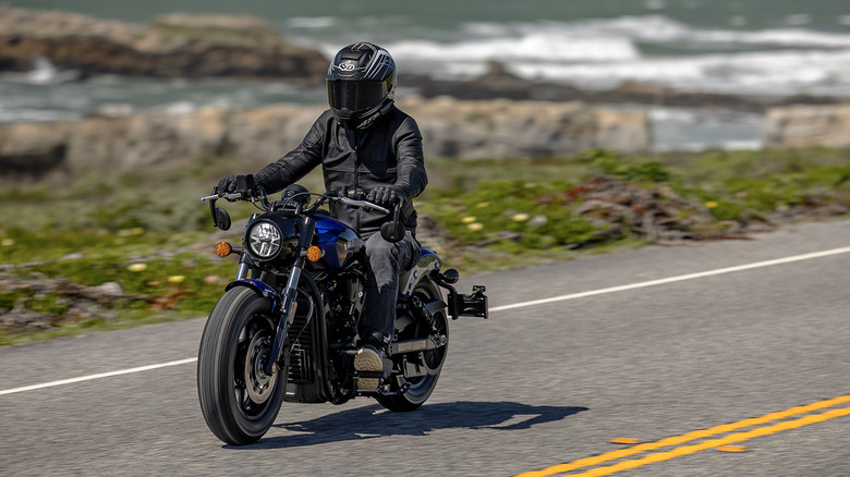 2025 Indian Scout Bobber cruising on Highway 1