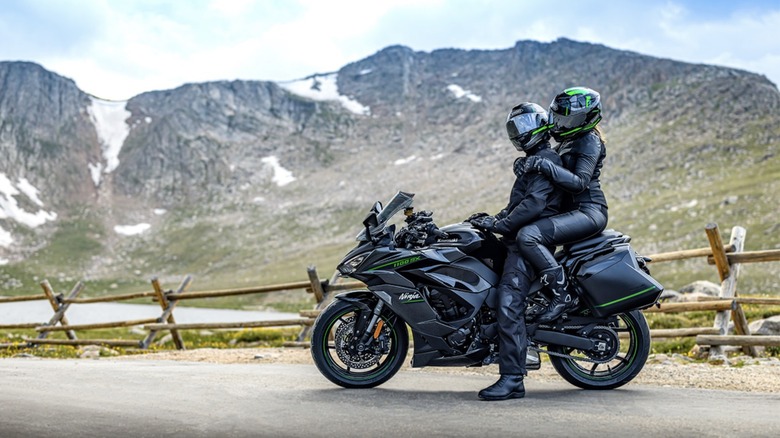 Couple riding 2025 Kawasaki Ninja 1100SX