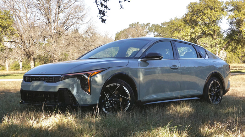 2025 Kia K4 parked in a field