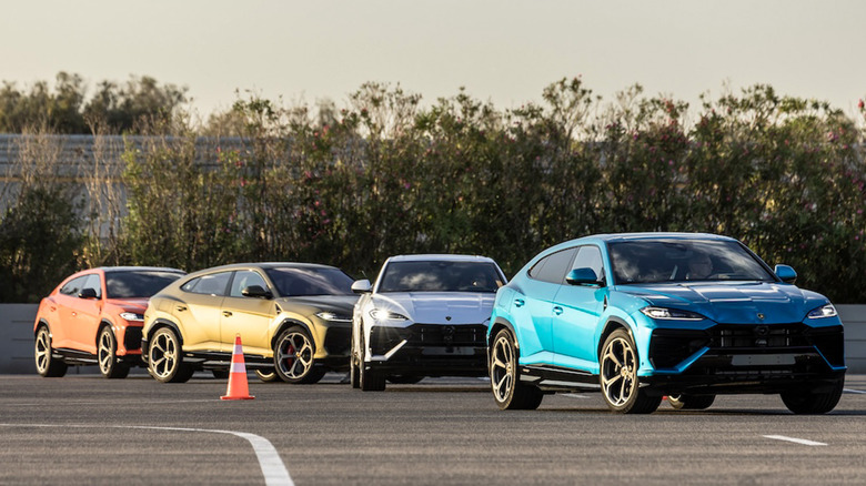 2025 Lamborghini Urus SEs lined up on a skid pad