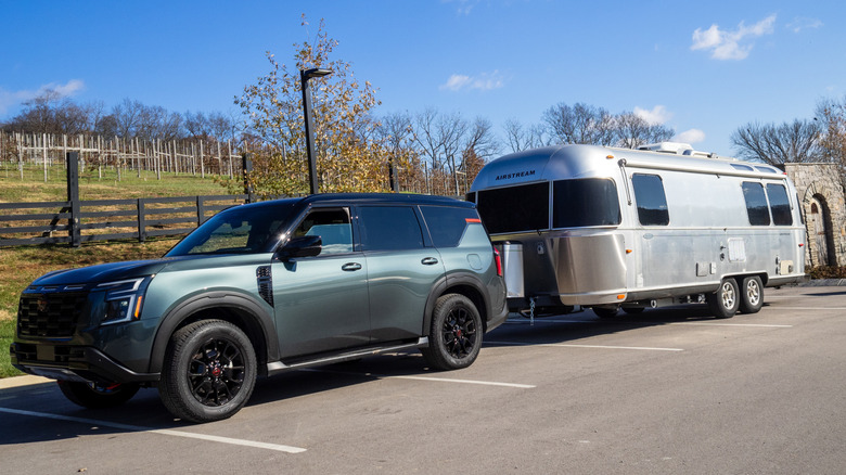 2025 Nissan Armada PRO-4X parked with Airstream trailer attached