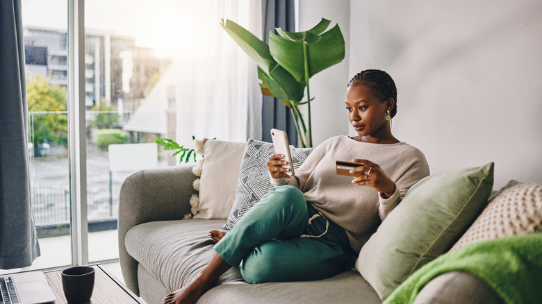 Woman making an online purchase with credit card