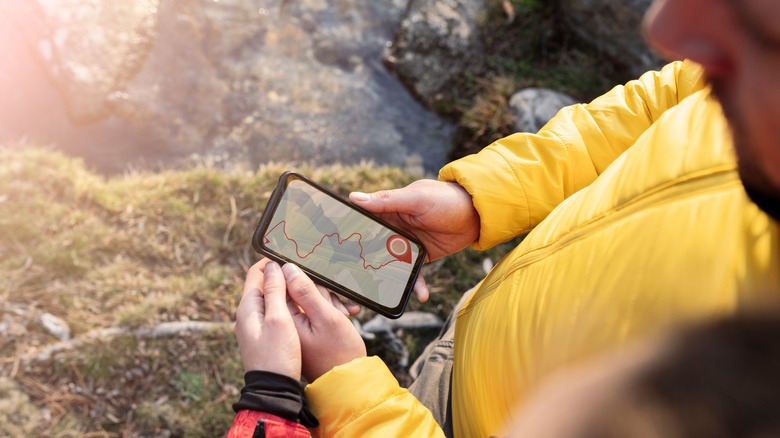 Man viewing map on a smartphone