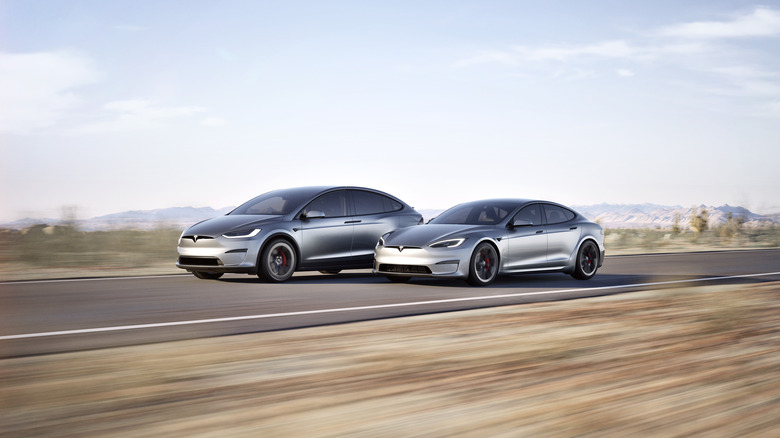 Tesla Model S and X driving on road