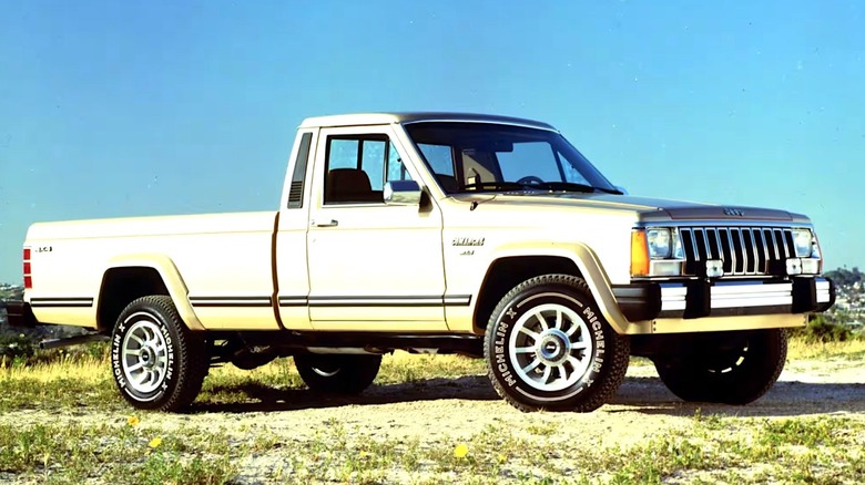 Jeep Comanche pickup parked on dirt road