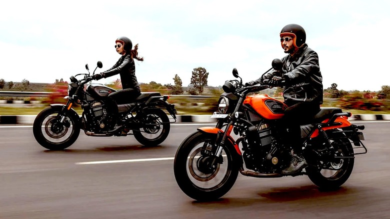 People riding a pair of Harley-Davidson X440s