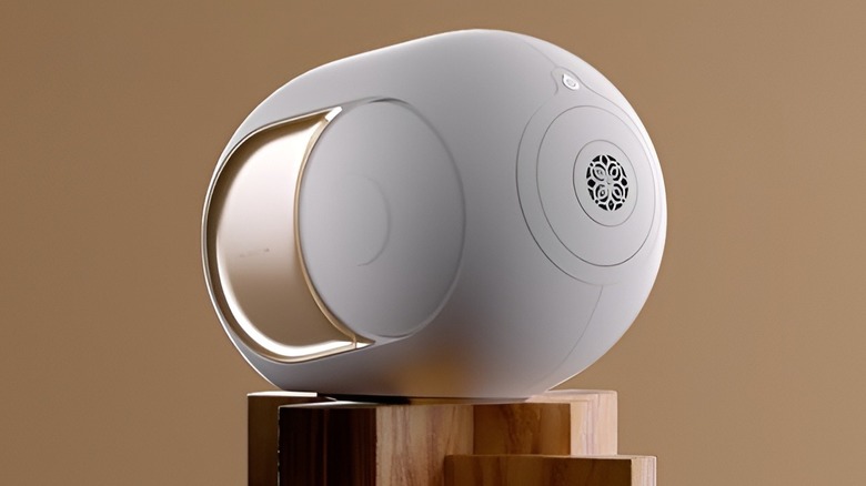 Devialet speaker on wood platform