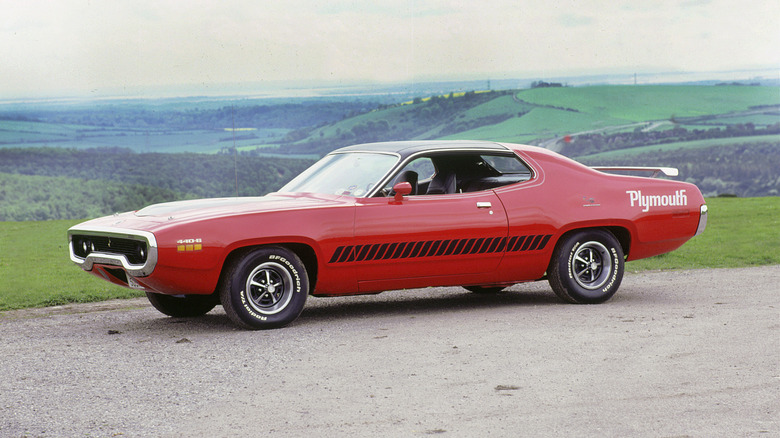 1970 Plymouth Roadrunner amid a grassy backdrop