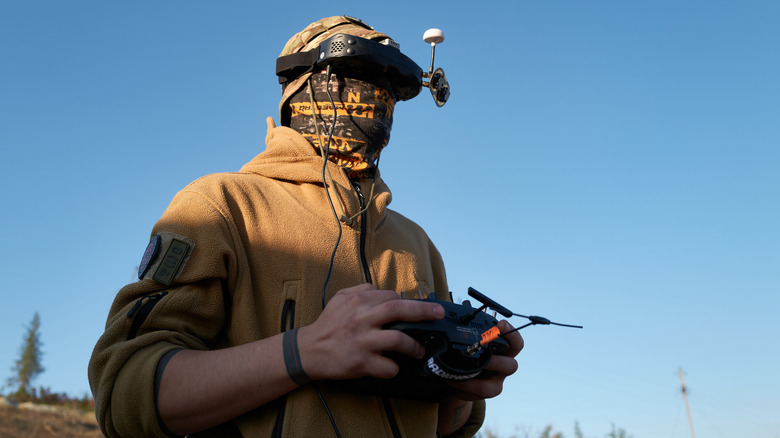 Soldier using drone controls and headset