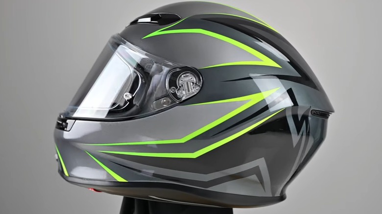 The side view of a AGV K6 motorcycle helmet on a stand