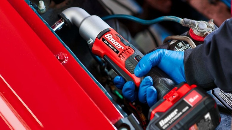 Bauer right-angle impact wrench being used in car