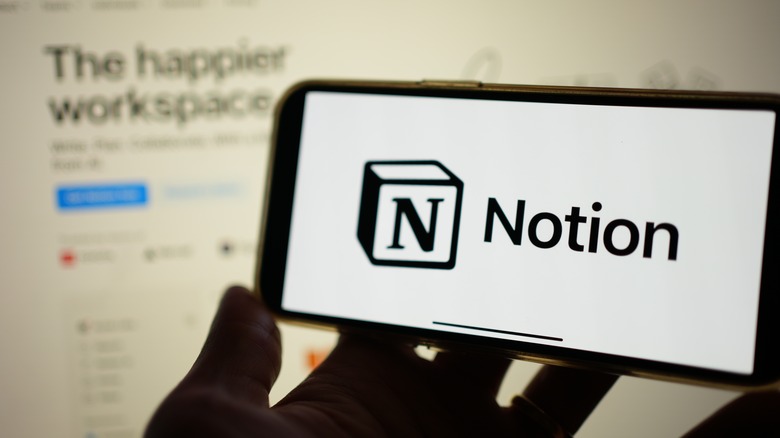 A mobile phone screen displaying the logo of Notion