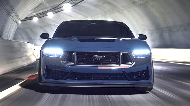 Ford Mustang cruising through a tunnel