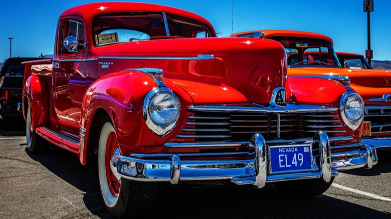 A Red Hudson pickup truck with Nevada license plates