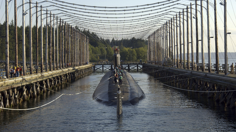 The USS Jimmy Carter in a flooded dry dock