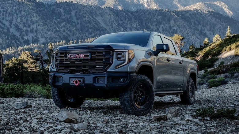 gray 2024 GMC Sierra 1500 parked on gravel