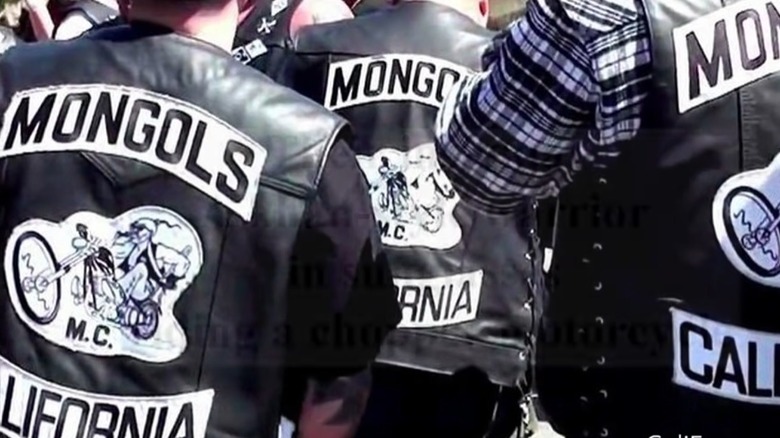 Members of the Mongols wearing their MC vests displaying their insignia.