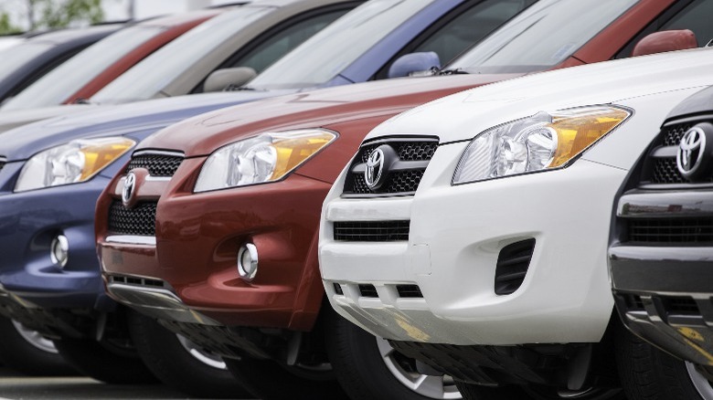 A row of parked RAV4s