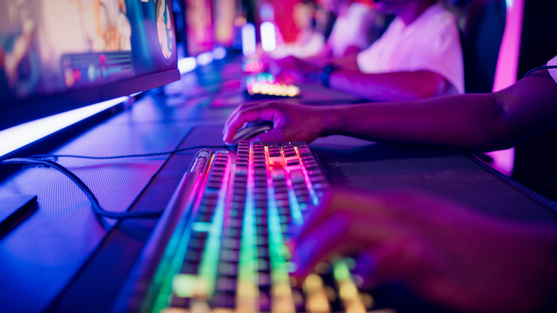 Competitive gamer using rainbow keyboard