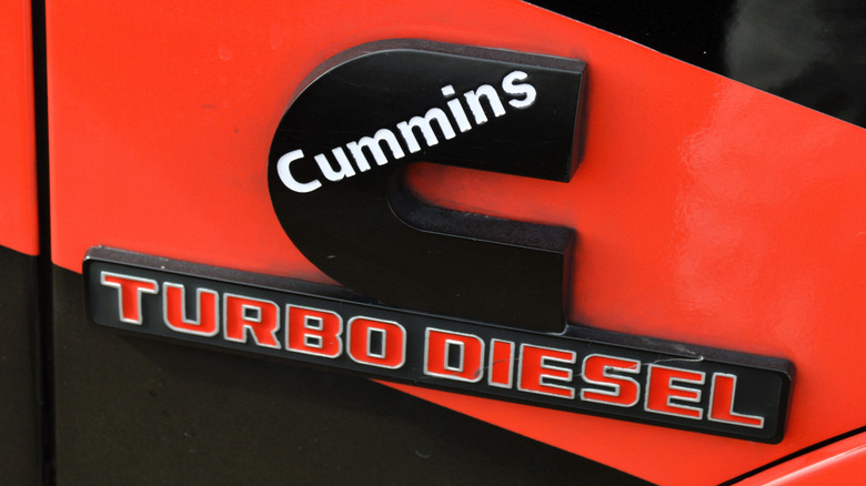 Cummins logo is displayed on a truck.