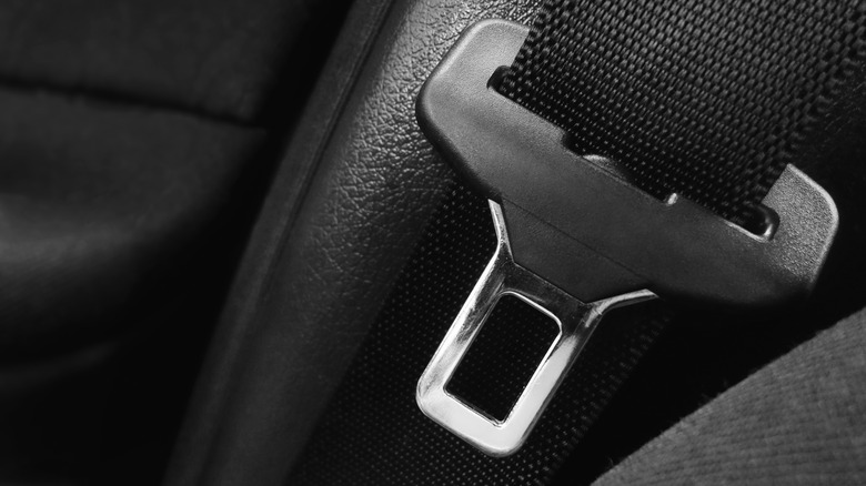 Close up of car seat belt buckle