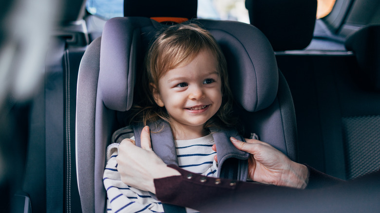 child in a car seat