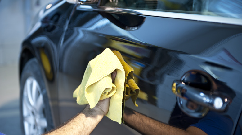 Removing wax with microfiber towel