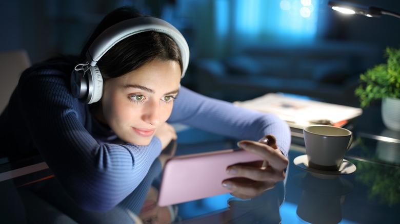 woman watching content on phone