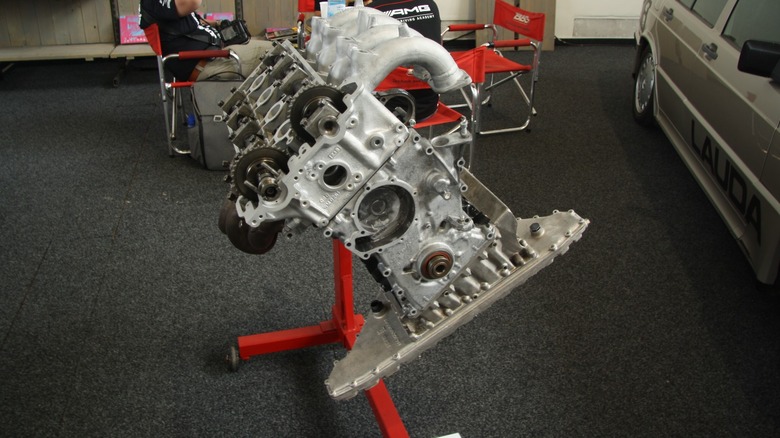 Mercedes motor on a red engine stand