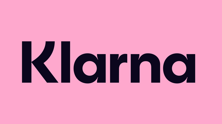 Pink and black Klarna logo