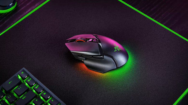 Razer Basilisk V3 Pro on a desk with RGB lighting