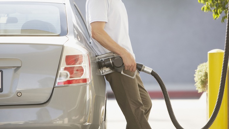 Man using gas pump