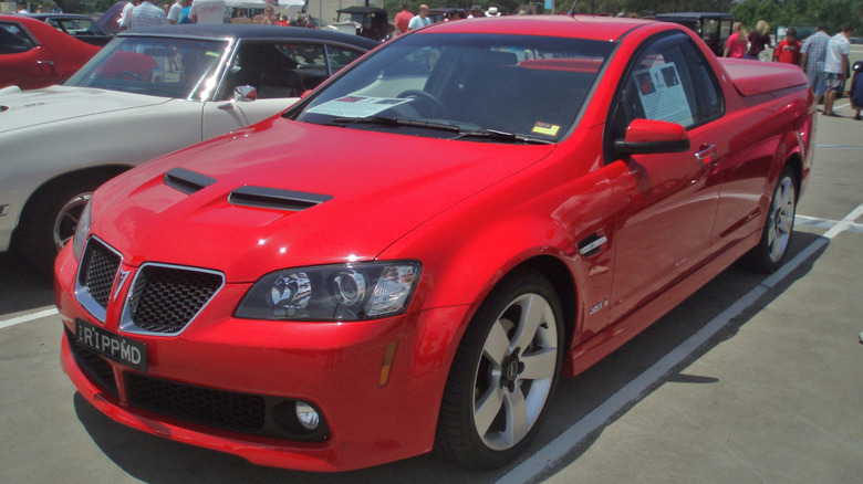 Red Holden Commodore with Pontiac G8 front end