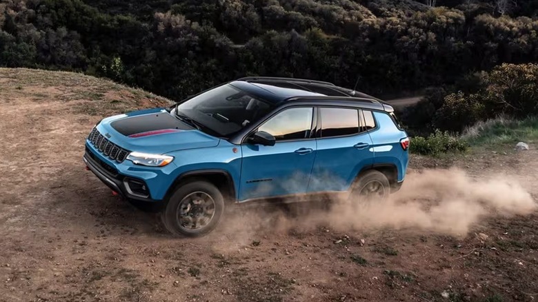 A 2025 Jeep Compass driving off-road