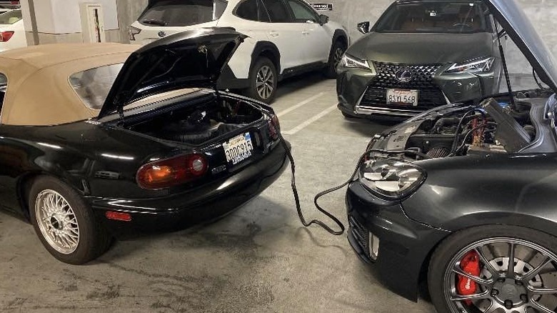 Miata getting jumped in garage