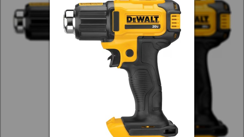 A yellow and black cordless DeWalt heat gun.