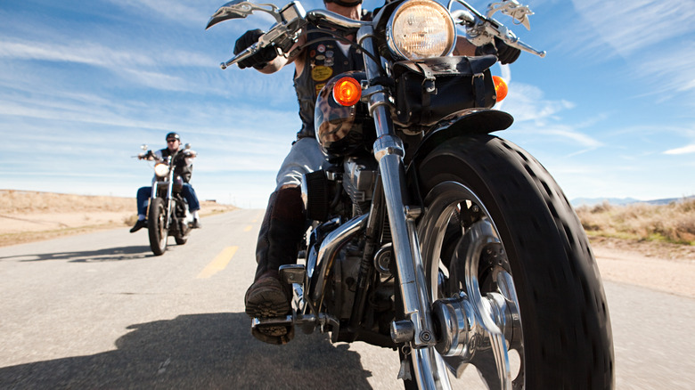 two riders on motorcycles