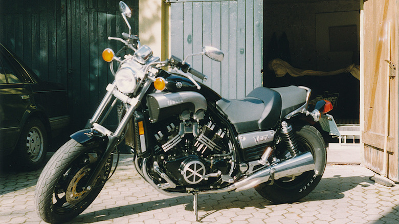 Yamaha VMAX parked outside of a garage