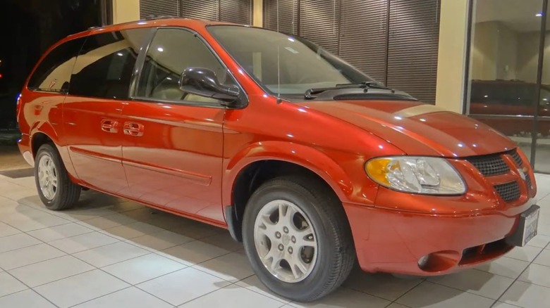 2004 Dodge Grand Caravan SXT In Red Inside A Showroom