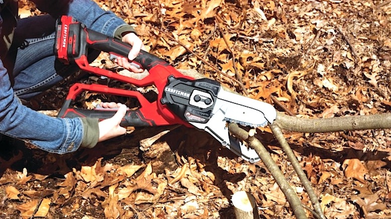 Person using Craftsman cordless saw