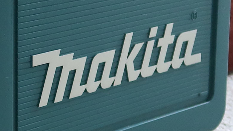 The Makita logo on the side of a tool box.