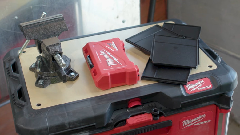 Milwaukee tools sitting on work top