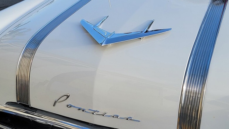 An airplane hood ornament on a 1956 Pontiac.