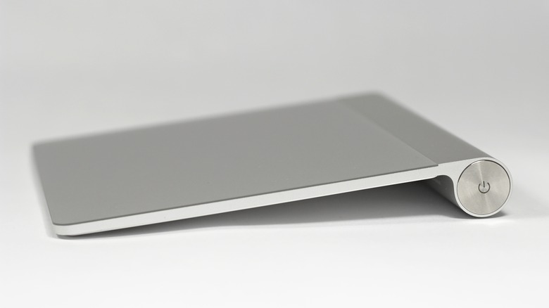 apple magic trackpad on table