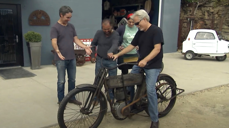 Mike Wolfe and company looking at 1911 Harley-Davidson