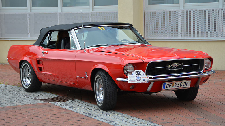 1967 Red Ford Mustang parked