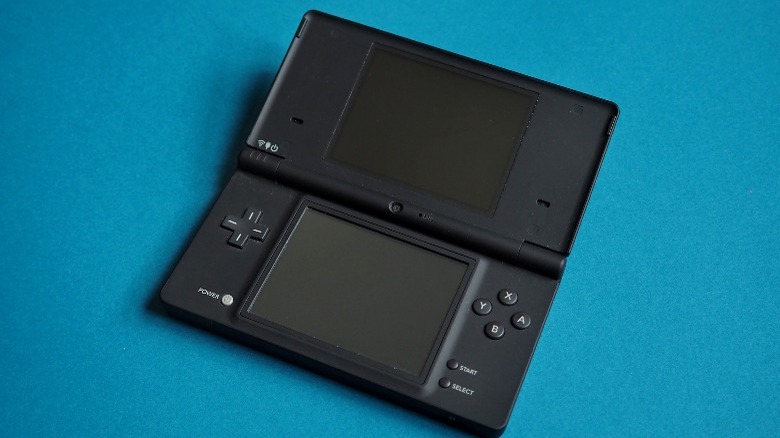 Nintendo DS on a blue backdrop