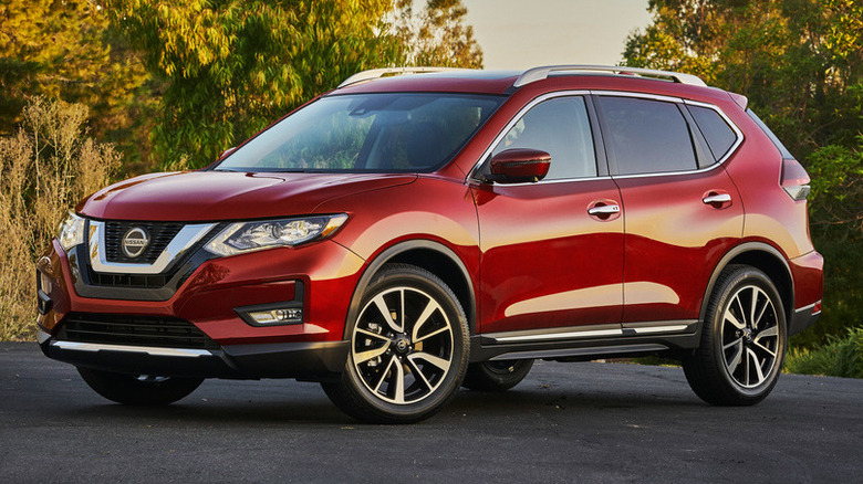 Red 2020 Nissan Rogue parked on tarmac